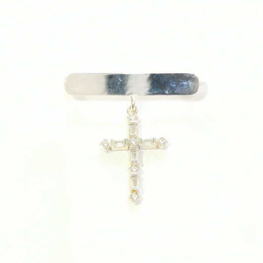 Imperdible plateado de cruz con zirconias