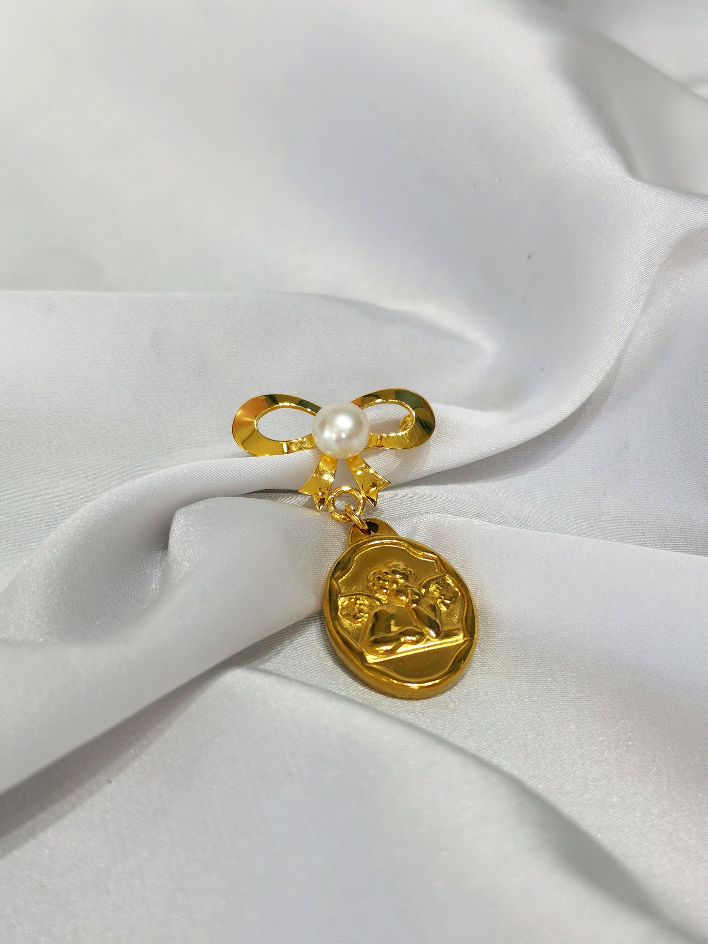 BROCHE MOÑO Y VIRGEN CON PERLA